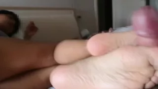 My Latina Girlfriend Gives Me A Side Footjob While Touching Her Pussy