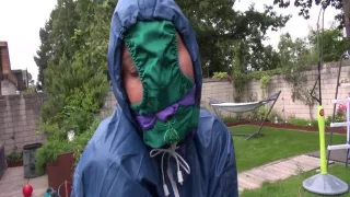 Watch Sandra Beeing Bound, Gagged With A Pantyhood In Her Oldschool Rainsuit