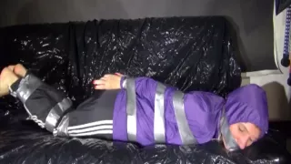 Get 2 Videos With Sandra From Our 2016 Archives Enjoying Bondage In Her Shiny Nylon Rainwear