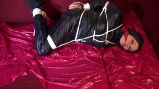 Get 2 Videos With Lucy Bound And Gagged Enjoying Her Shiny Nylon Rainwear From Our 2016 Archive
