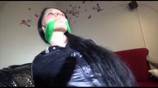 Get 2 Videos Of Lucy Tied And Gagged In Shiny Nylon Rain- And Sportswear From Our 2015 Archives