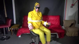 Sexy Pia Being Tied And Gagged On A Chair Wearing Sexy Shiny Nylon Rainwear (Video)