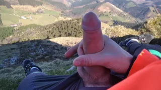 Jock In Fishnet Jerks His Big Fat Cock And Cums On Top Of The Mountain