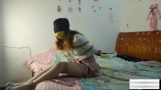 Chinese Cutie In Ropes