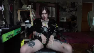 Girl In A Latex And Corset Plays With Herself Jerking Off Sucking A Dildo And Fucking With It
