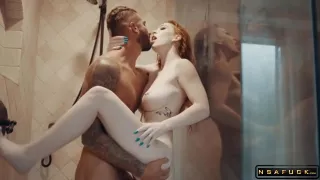 Busty Redhead Milf Has A Tattooed Stud