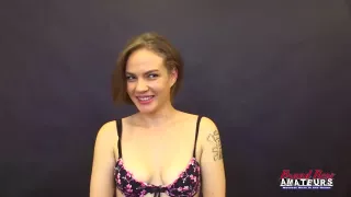 Tattooed, blonde teen with blue eyes is using her deep throat to satisfy a black man