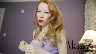 Big tited milf with seductive lips is twisting her boobs, while in front of the camera