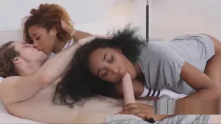 Curly black teens sharing white cock in threeway