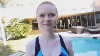 Teen ginger ass on black dark by the pool