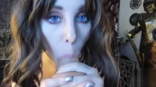 Deepthroating herself with dildo