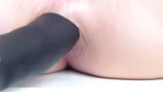 Lonely German milf sticks dildo in anal