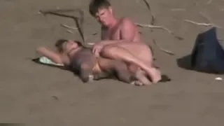 Lusty mature momma gets her shaved taco fingered on beach
