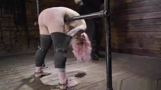 Bent over metal device blonde whipped