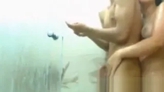 Young Young Couple Having Fun In Shower