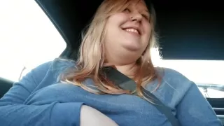 Girl plays with boobs while driving around