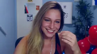 Acrobat college girl standing on her hands as the