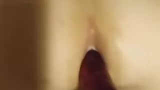 Wife fucks husband's ass with big purple dildo