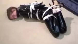 Latex bondage hogtied