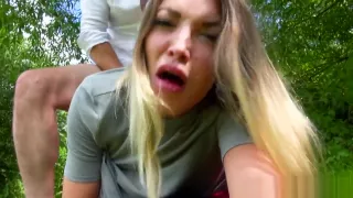 Busty teen cockriding outdoors in public