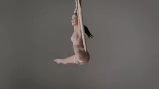 Nude anti-gravity yoga