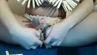 Clamps on slut playing webcam
