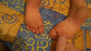 stepson jerks on his mother's feet while she sleeps and cums on her heels