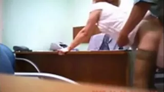 He fucks her colleague in his office