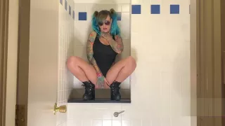 Ms Hayley B masturbating in a hotel bathroom she Squirts everywhere then licks her fingers