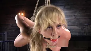 Busty Milf slave in bondage pussy fingered
