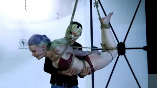 Cute girl in tight bondage crying for mercy