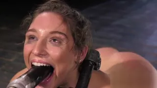 Bound brunette endurs pain from huge dildo