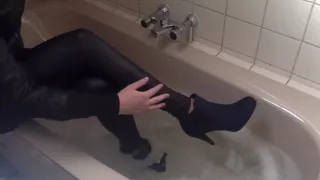 Sexy tight pants ankle boots and heels in bath