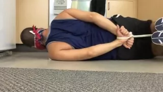 Hogtied Jock Gagged with a Tennis Ball