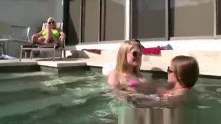 Dykes make out in the pool