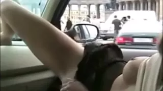 Girl flashes in moving car
