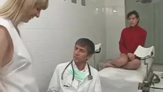 Doctor and nurse team on a patient