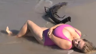 Big breast on the beach