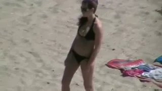 Playing football on the beach