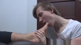 He works his cock while Kyle licks his sexy feet and toes