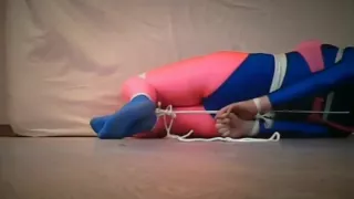 Selfbondage in pink and blue lycra