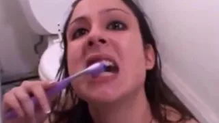 brunette cumbrushing scene