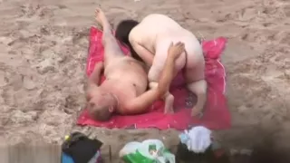 Horny matures caught at the nude beach