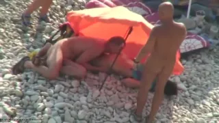 Real swingers at a nudist beach