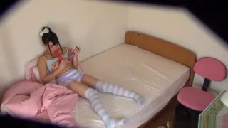 Solo girl enjoys her shaved pussy toyed