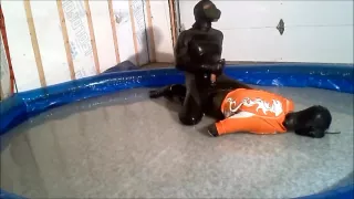 Frogman humps and shoots over surfer in shallow pool water