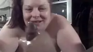 BBW giving a blowjob to her ebony lover
