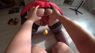 milf with big ass pushes peaches out of pussy, lesbians. pov of a wet hole
