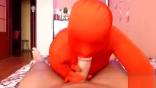 Sexy curvy australian in an orange jumpsuit