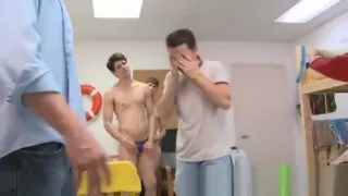 Gay frat aspirant modeling in a tiny thong